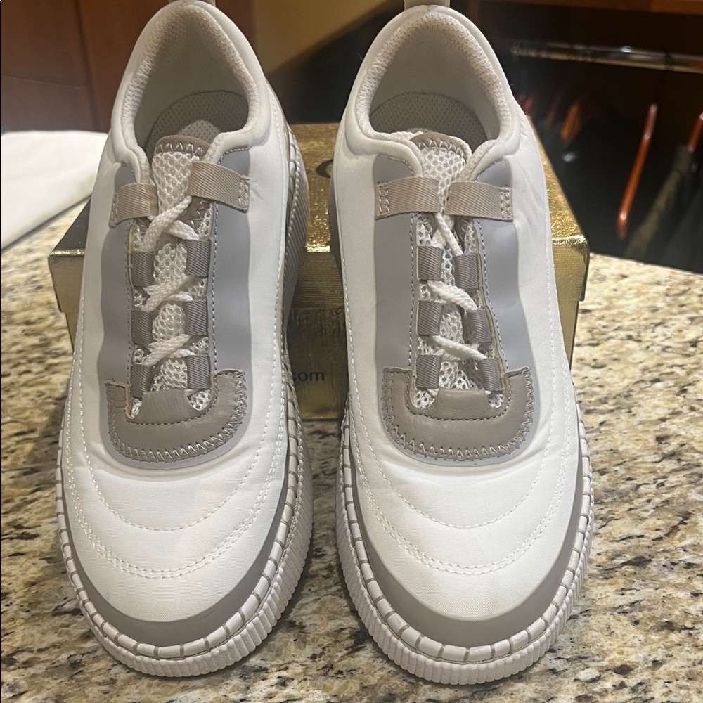 Cougar fashion walking sneakers.